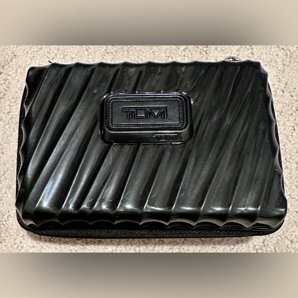 New Without Tag Tumi Delta One Amenities Kit, with select Amenities inside.